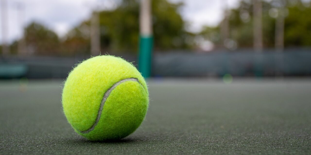 The First Yellow Tennis Ball
